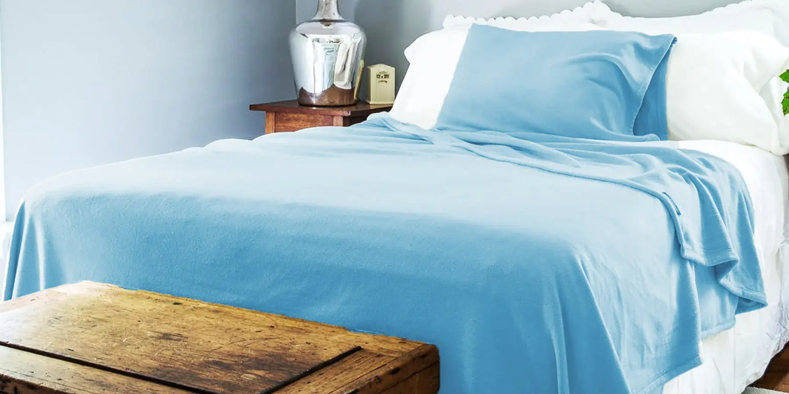 American Blanket Company - A soft bedroom photo featuring soft peaceful touch fleece blankets and fleece pillow cases