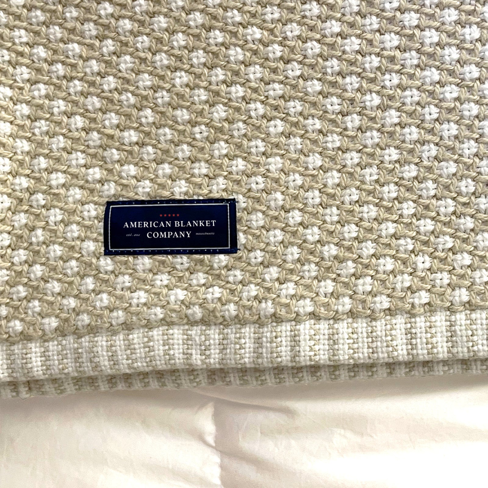American Blanket Company - Cotton Blanket, 100% Cotton Blanket Lattice Weave  Cotton Blanket - Detail shot of the woven natural and white lattice weave, and a closeup of the woven hemmed edge.