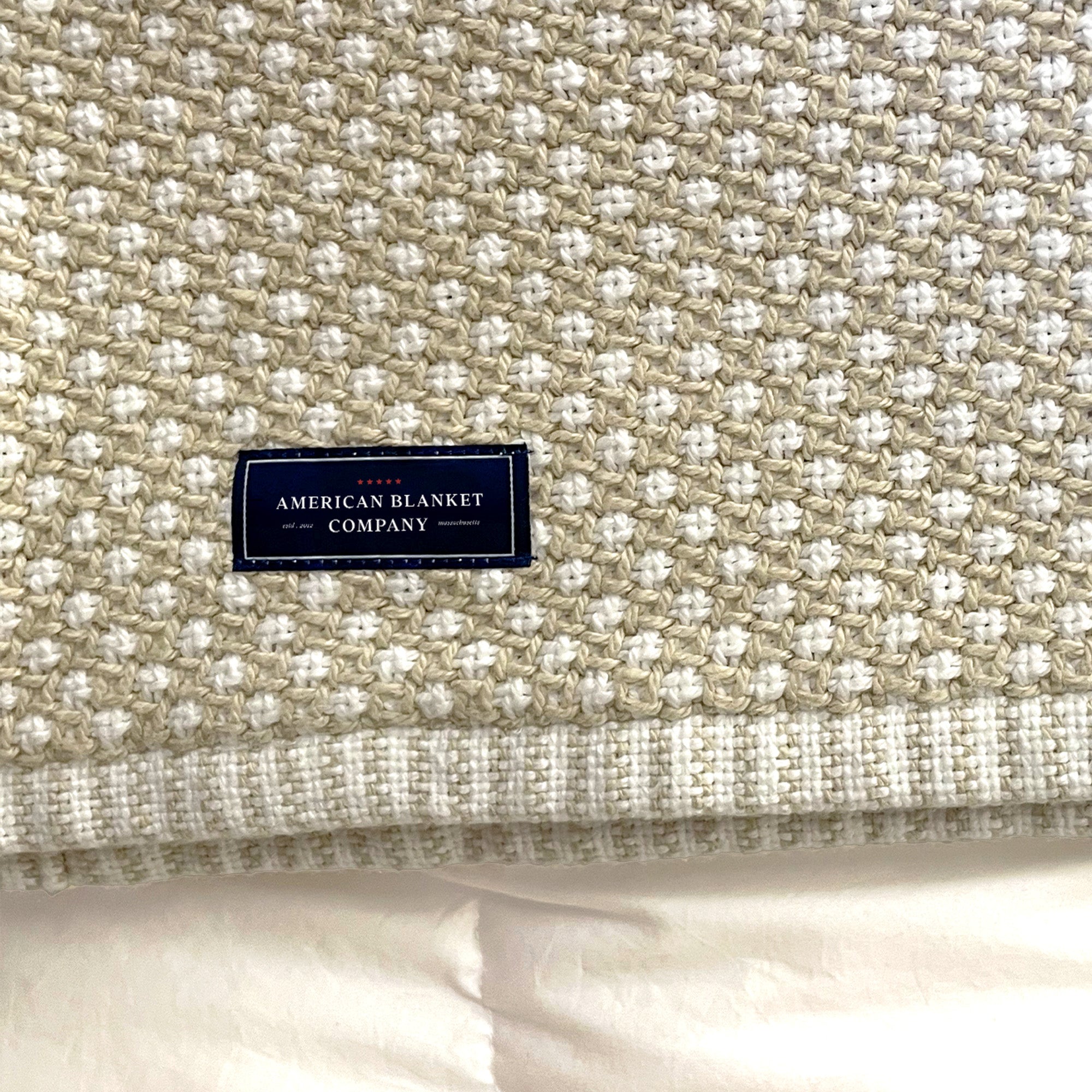 American Blanket Company - Cotton Blanket, 100% Cotton Blanket Lattice Weave  Cotton Blanket - Detail shot of the woven natural and white lattice weave, and a closeup of the woven hemmed edge.
