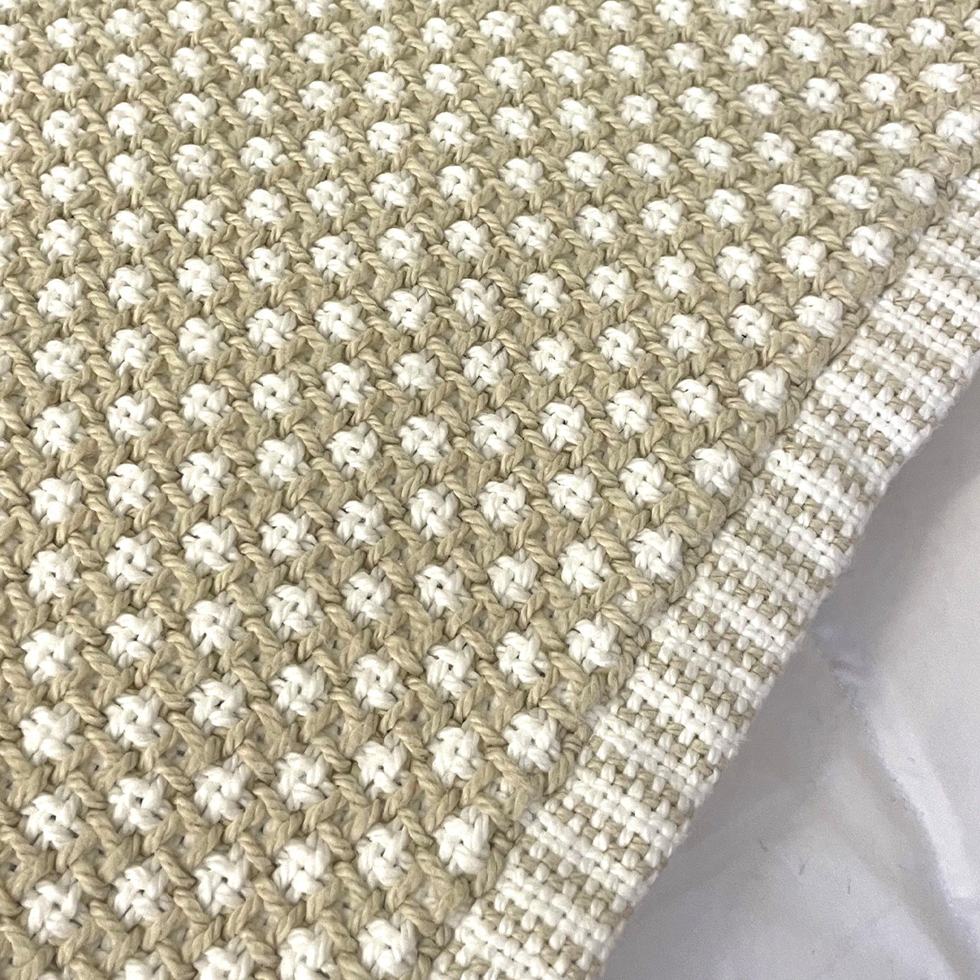 American Blanket Company - Cotton Blanket, 100% Cotton Lattice Weave Cotton Blanket - Close up of the natural and white woven pattern, with the woven hemmed edge