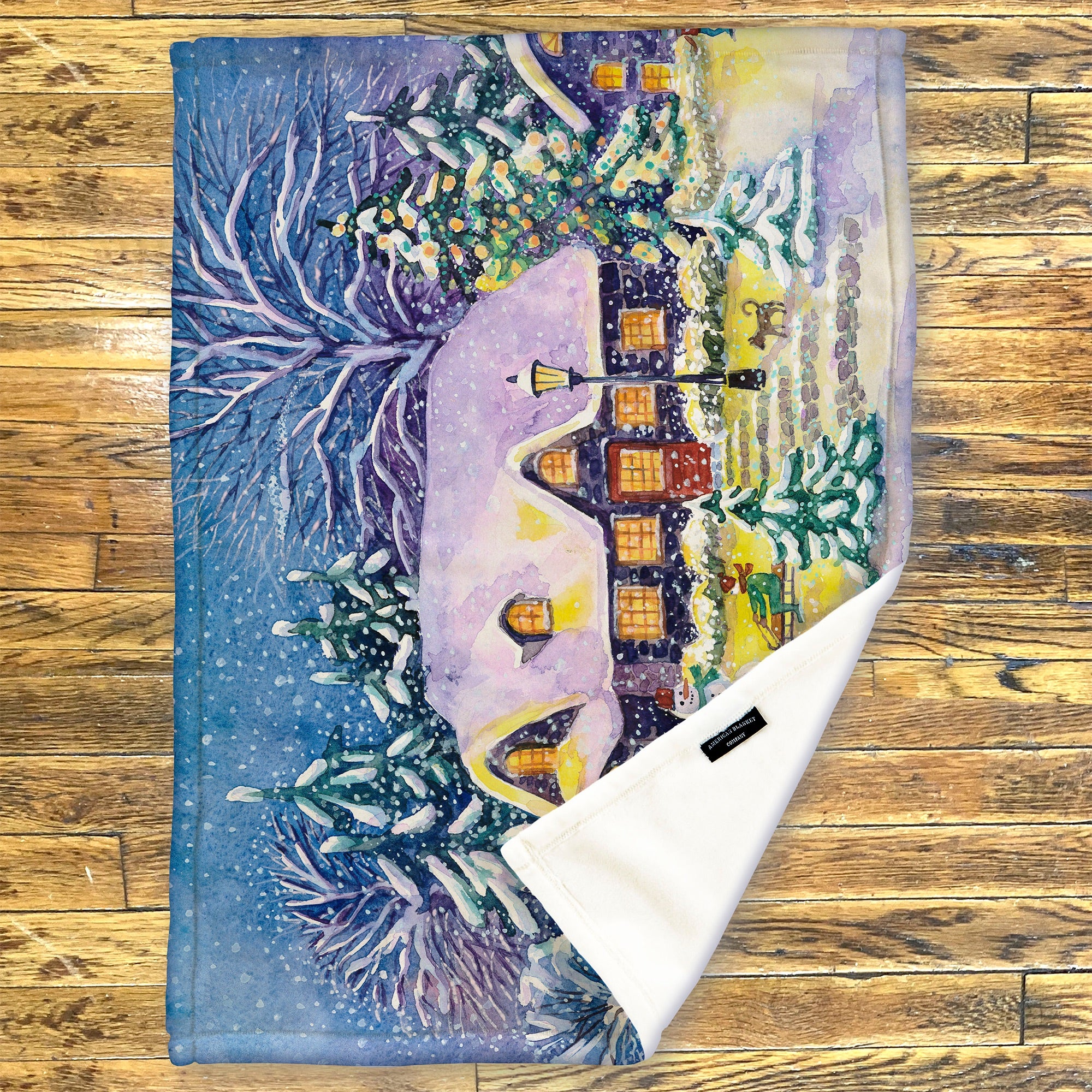 American Blanket Company - Luster Loft Fleece Blanket - Printed Holiday Throw Blanket - Fleece blanket with a winter scene design on a wooden surface