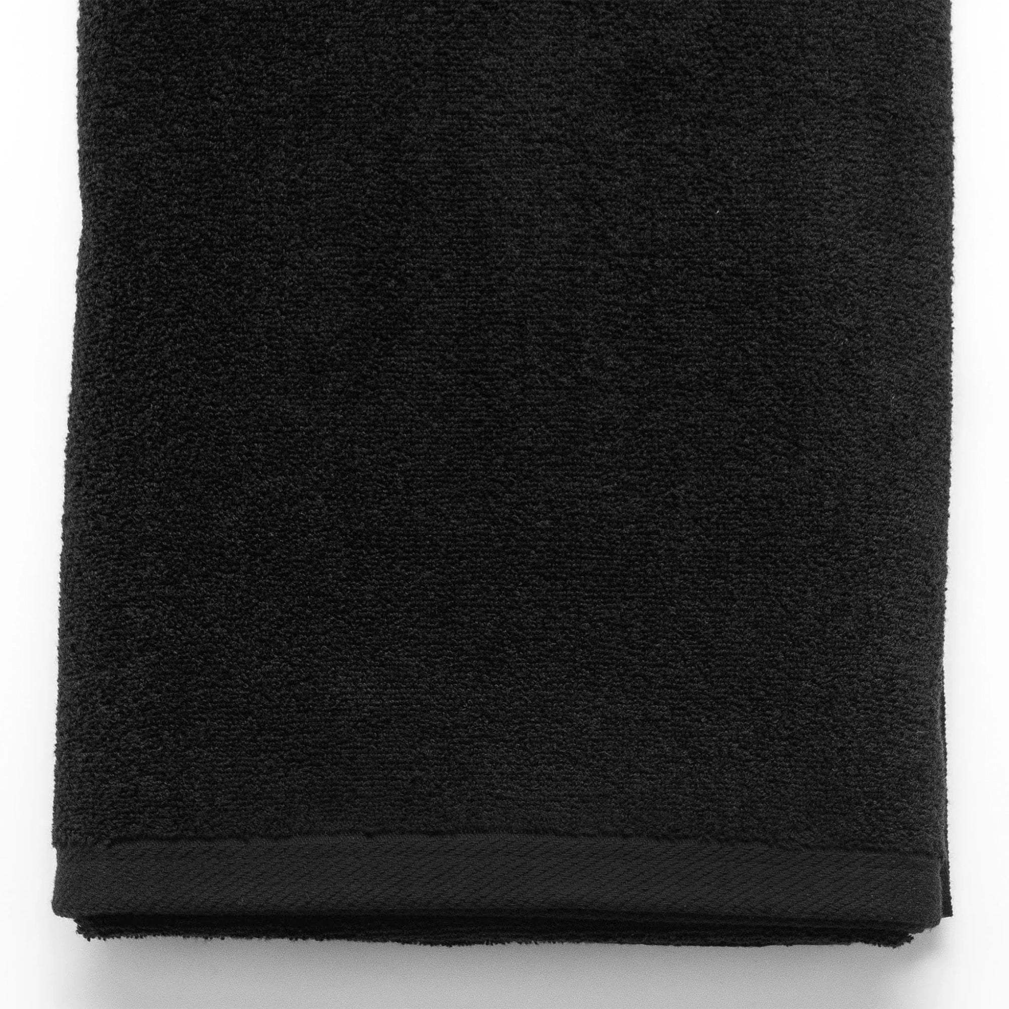American Blanket Company -  Colorful Made in the USA 100% Cotton towels - Folded black towel on a white background