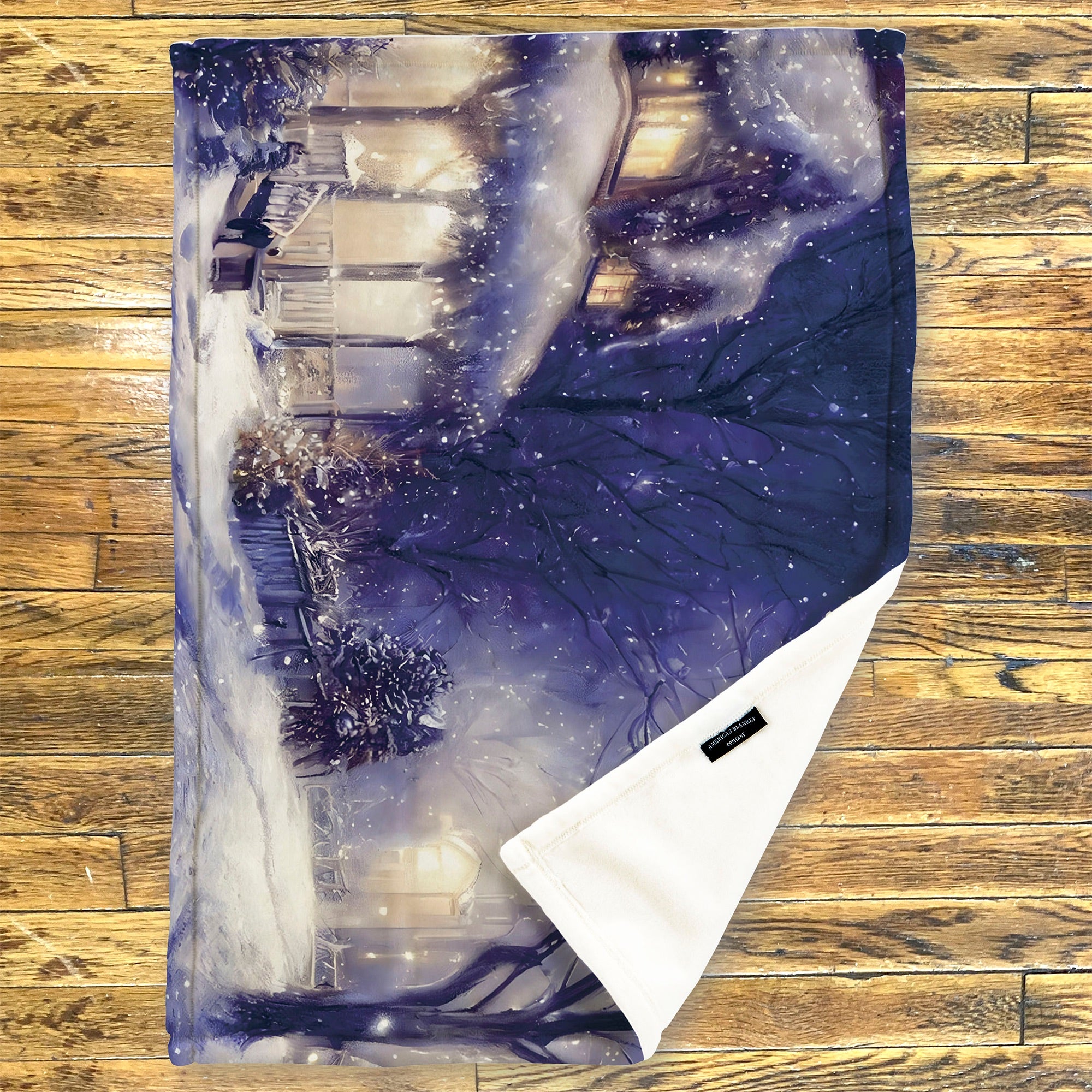 American Blanket Company - Luster Loft Fleece Blanket - Printed Holiday Throw Blanket - Fleece blanket with winter scene design on a wooden surface