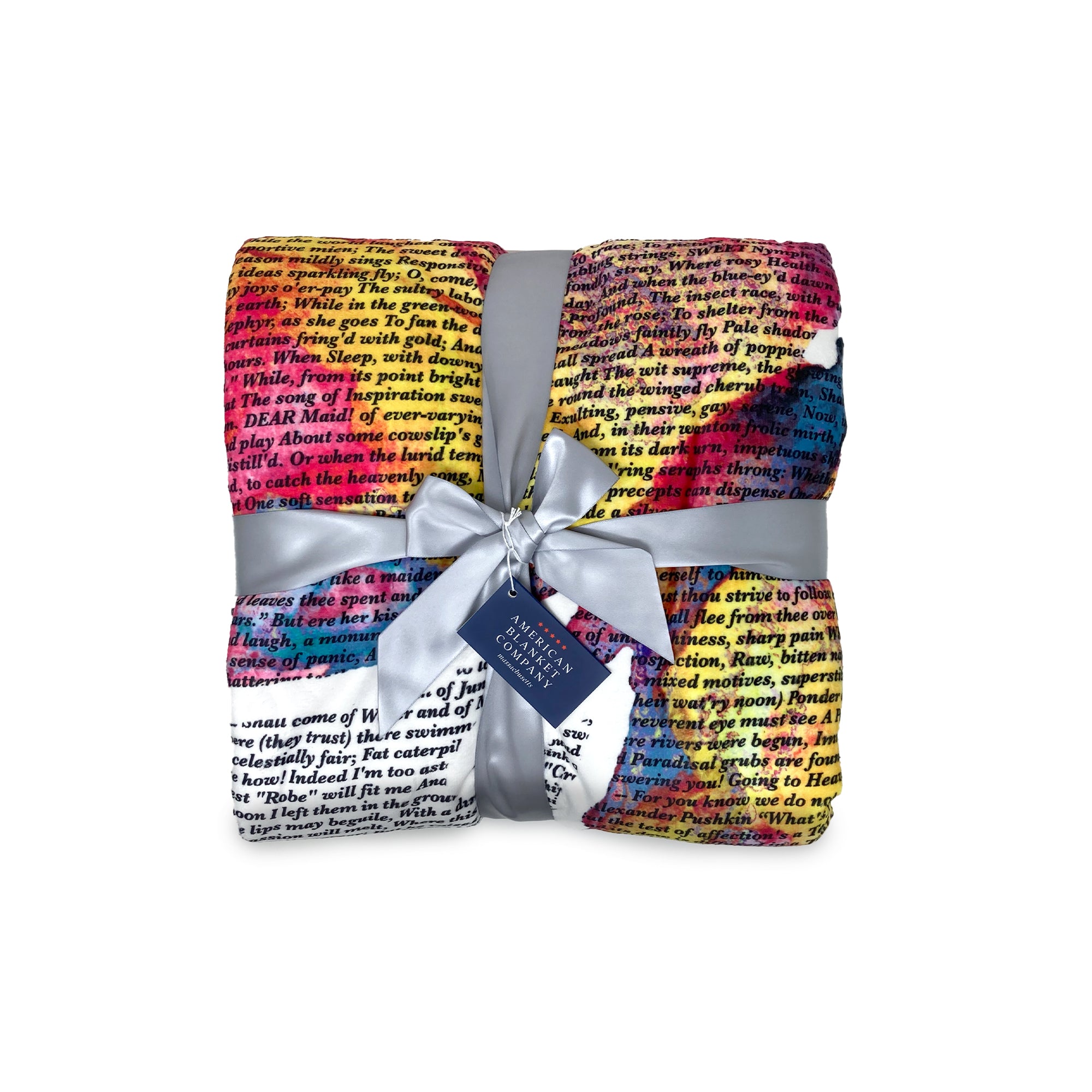 American Blanket Company - Butterfly Printed inspirational poem blanket - Folded detail shot of the vibrant butterfly blanket, tied with a ribbon and a hangtag.