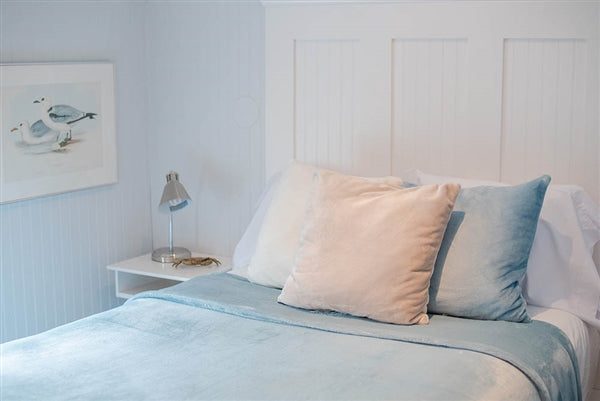 American blanket company - luster loft Fleece throw pillow 17x17 - throw pillows on a bed with a luster loft fleece blanket on the bed.