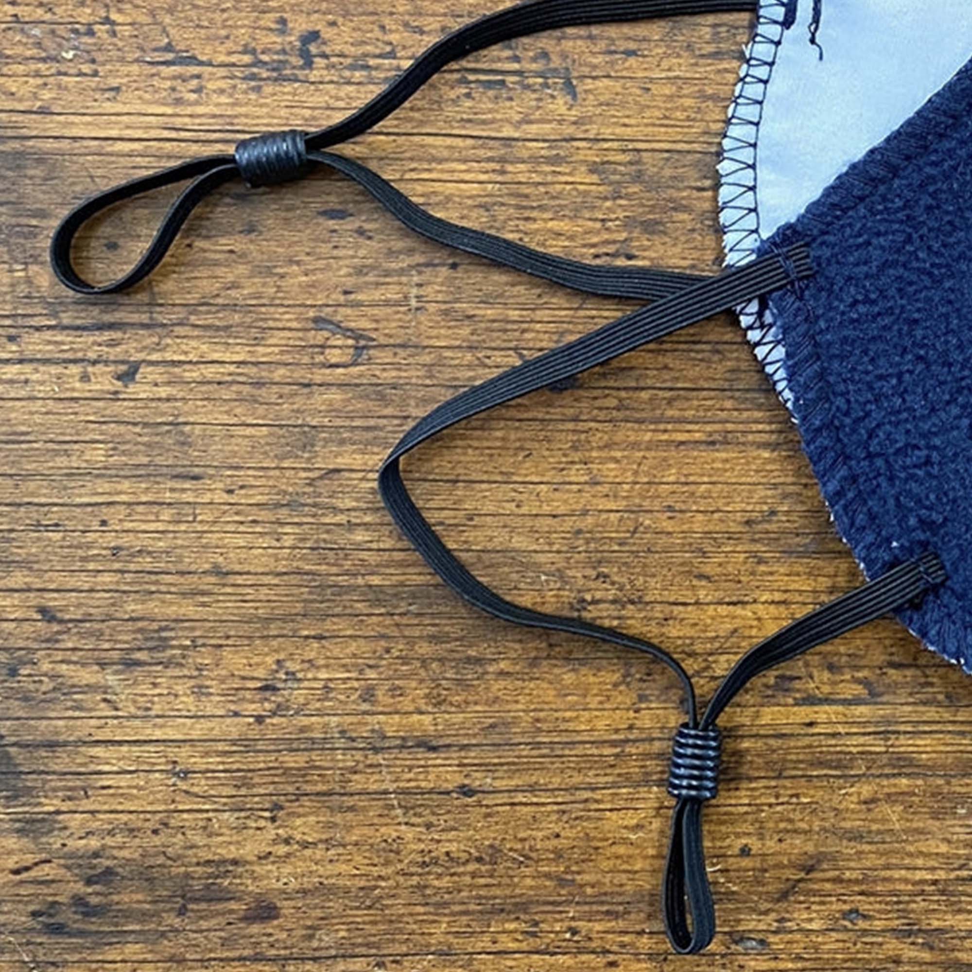 American Blanket Company - Peaceful touch fleece face mask - detail of soft adjustable ear loops - soft face fleece mask