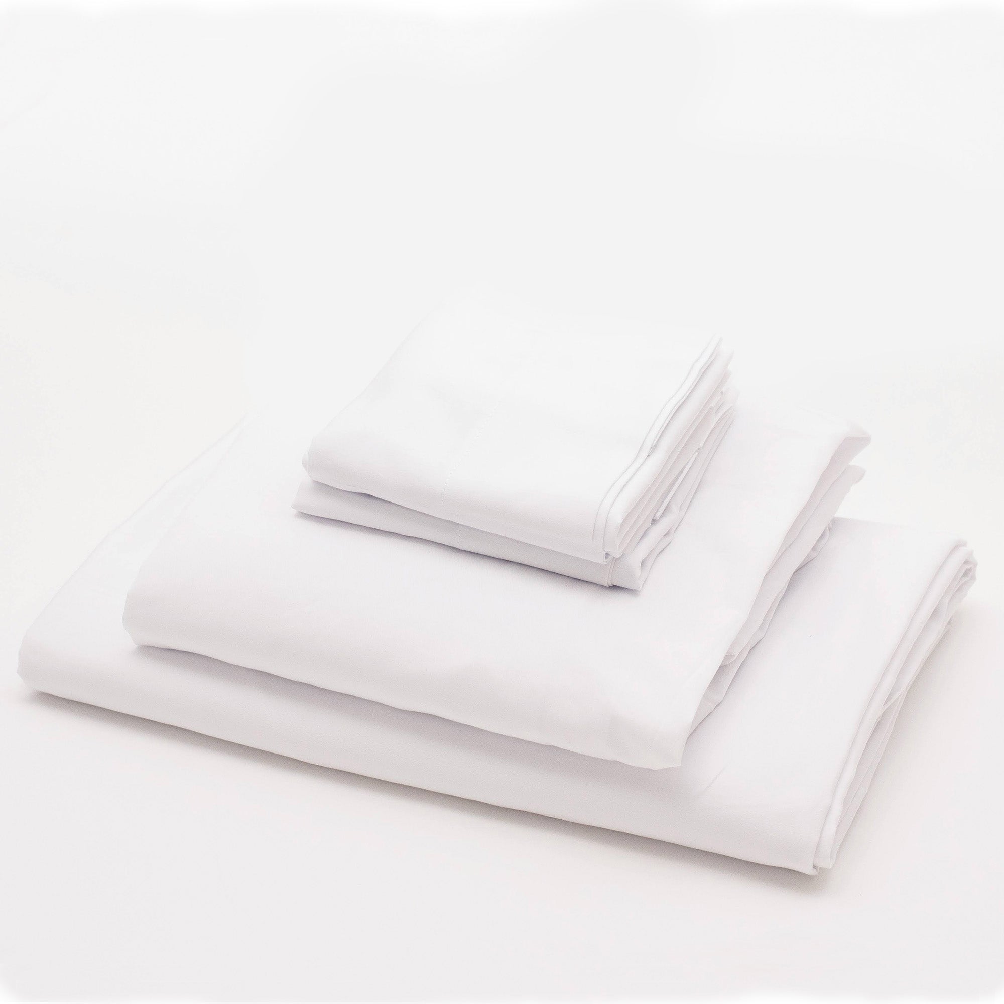 American Blanket Company - 100% Cotton Sheets and pillowcases Made In USA - stack of crisp cotton sheets and pillowcase