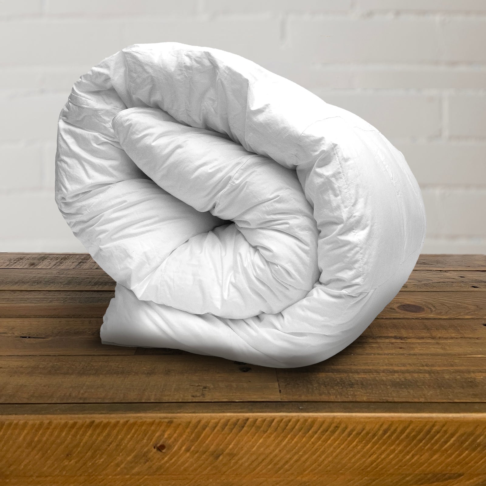 American Blanket Company - Luxury Hypo-Allergenic Comforter - Rolled Up on a white background
