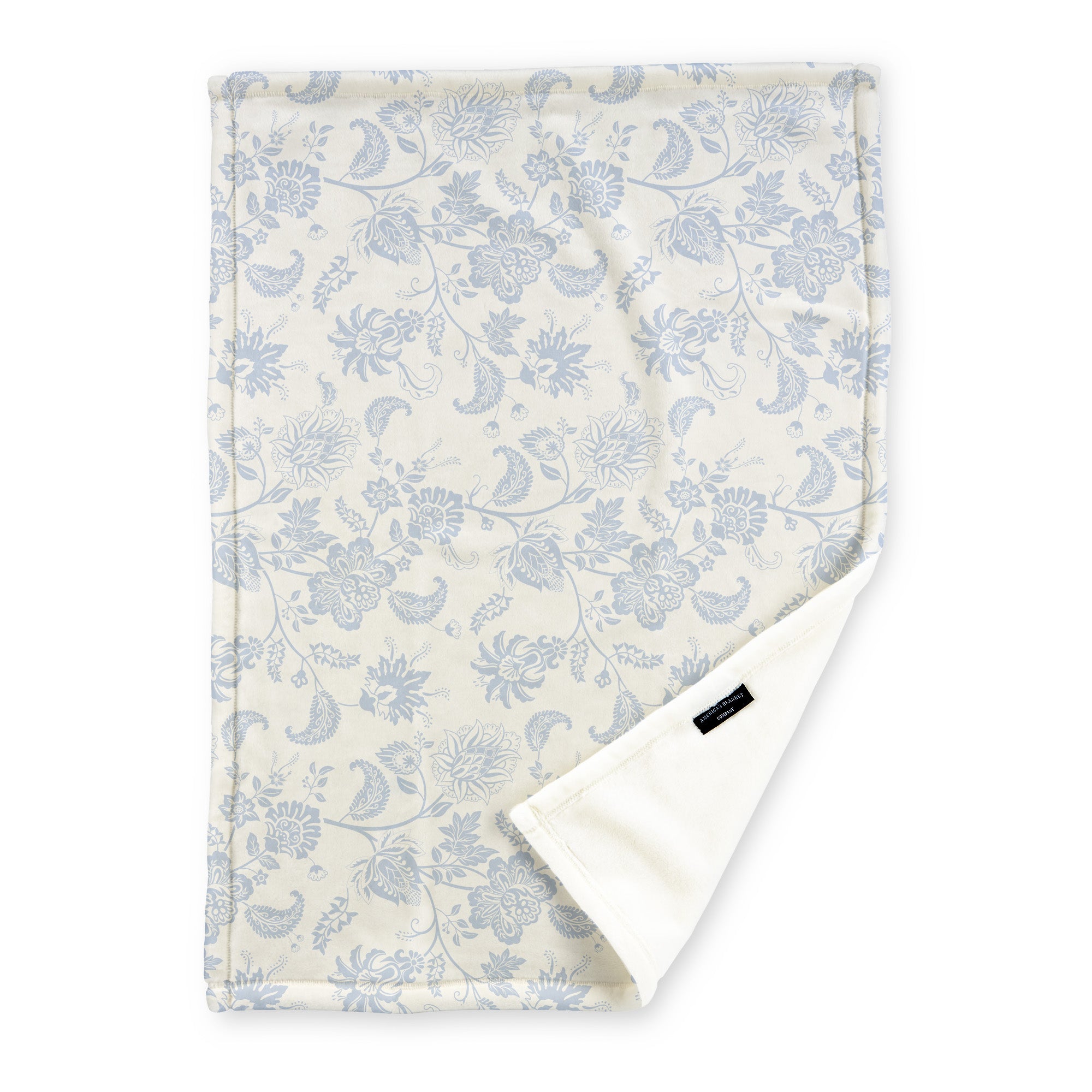 American Blanket Company - Luster Loft Fleece Blanket - Floral Printed Blankets Throws - a fleece blanket with abstract light blue floral patterns on a white background.