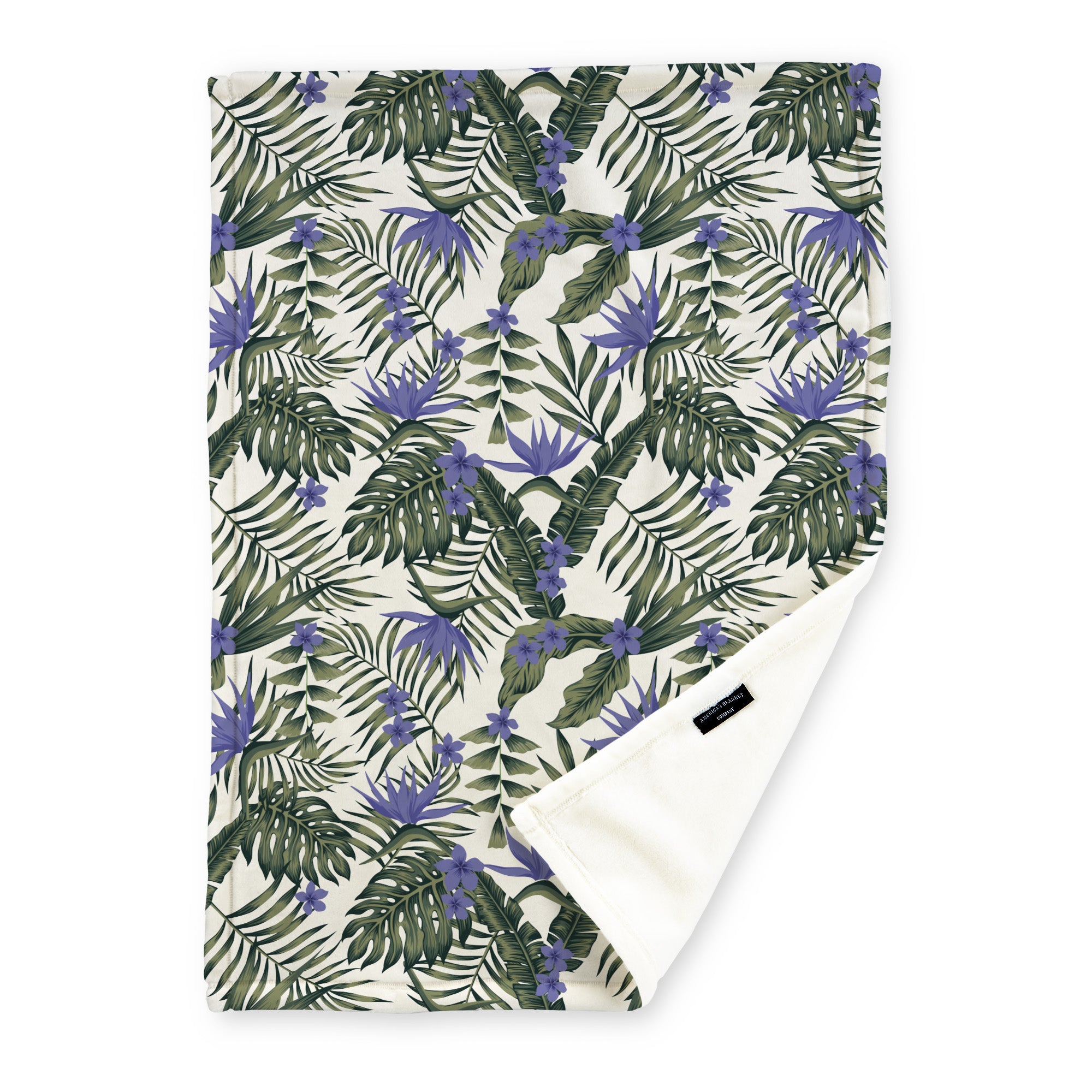 American Blanket Company - Luster Loft Fleece Blanket - Floral Printed Blankets Throws - a floral pattern with green fronds and exotic Navy flowers on a beige background printed on a fleece blanket.