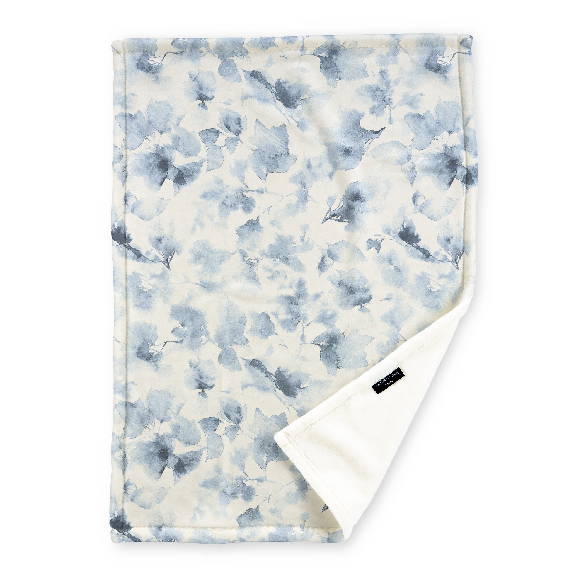 American Blanket Company - Luster Loft Fleece Blanket - Floral Printed Blankets Throws - a fleece blanket with abstract floral pattern in a range of light blues on a white background.