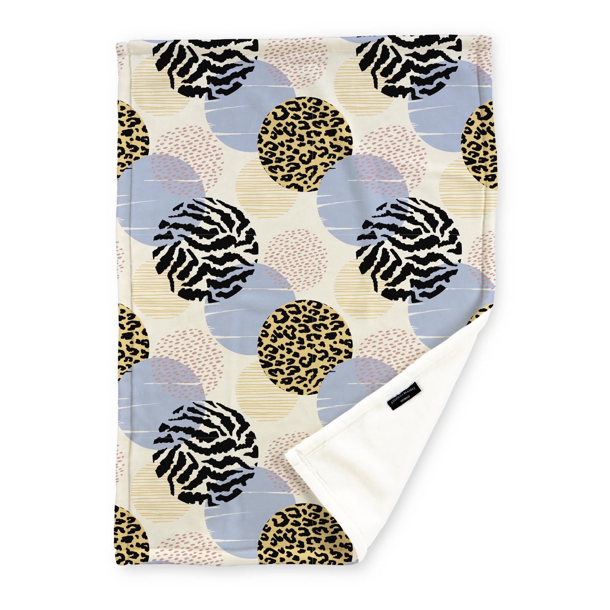 American Blanket Company - Luster Loft Fleece Blankets - Printed Fashion Fleece Throw Blankets - a Fleece blanket with a multicolored abstract circle pattern with yellow, light blue, pink, and black on a cream background.