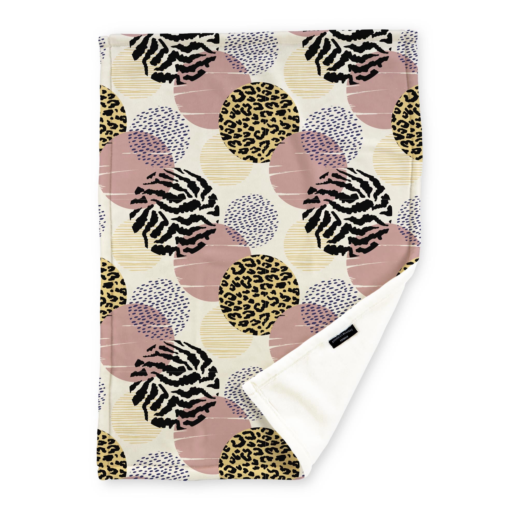 American Blanket Company - Luster Loft Fleece Blankets - Printed Fashion Fleece Throw Blankets - a Fleece blanket with a multicolored abstract circle pattern with yellow, navy, pink, and black on a cream background.