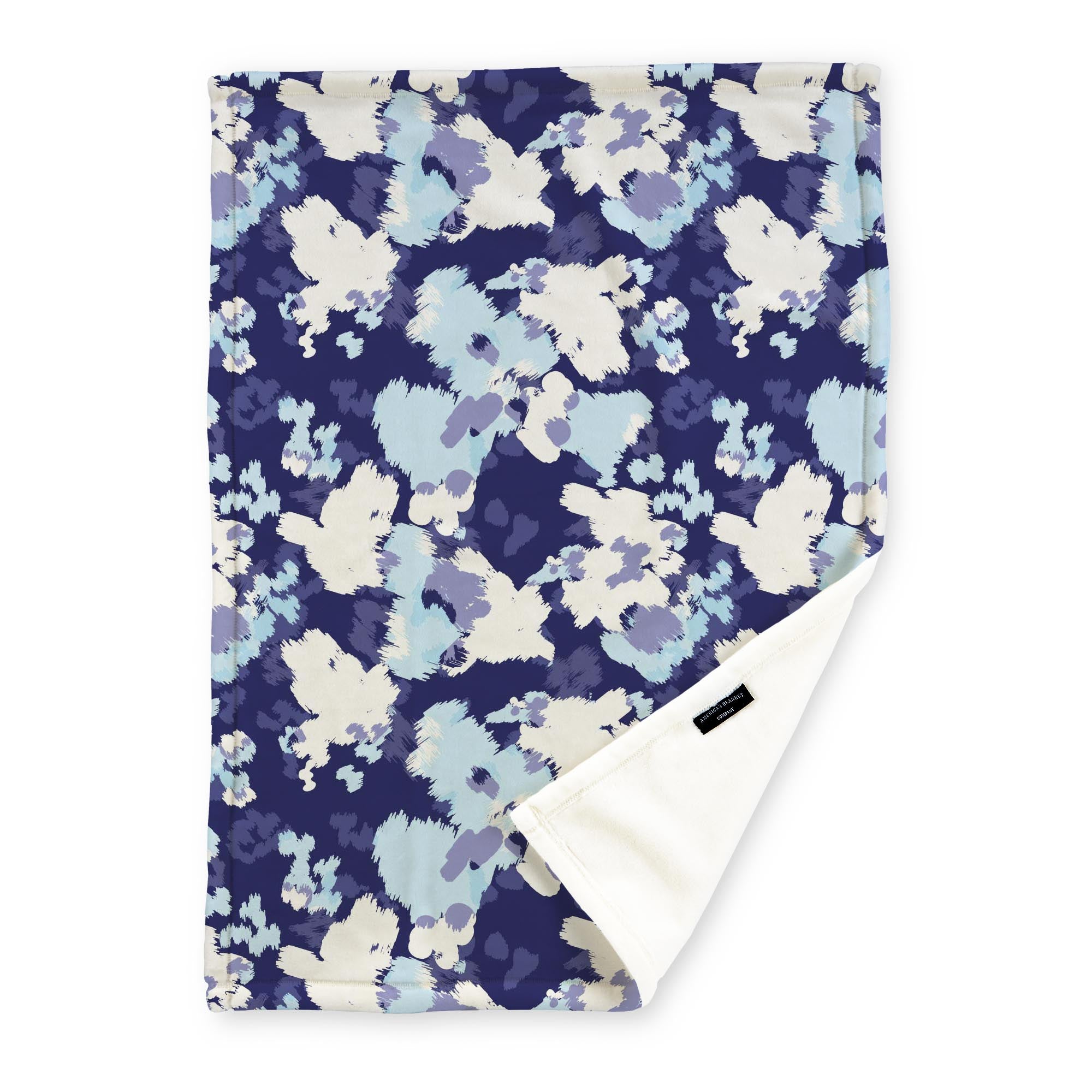 American Blanket Company - Luster Loft Fleece Blankets - Printed Fashion Fleece Throw Blankets - a Fleece blanket with a multicolored abstract camouflage pattern on a dark blue background.