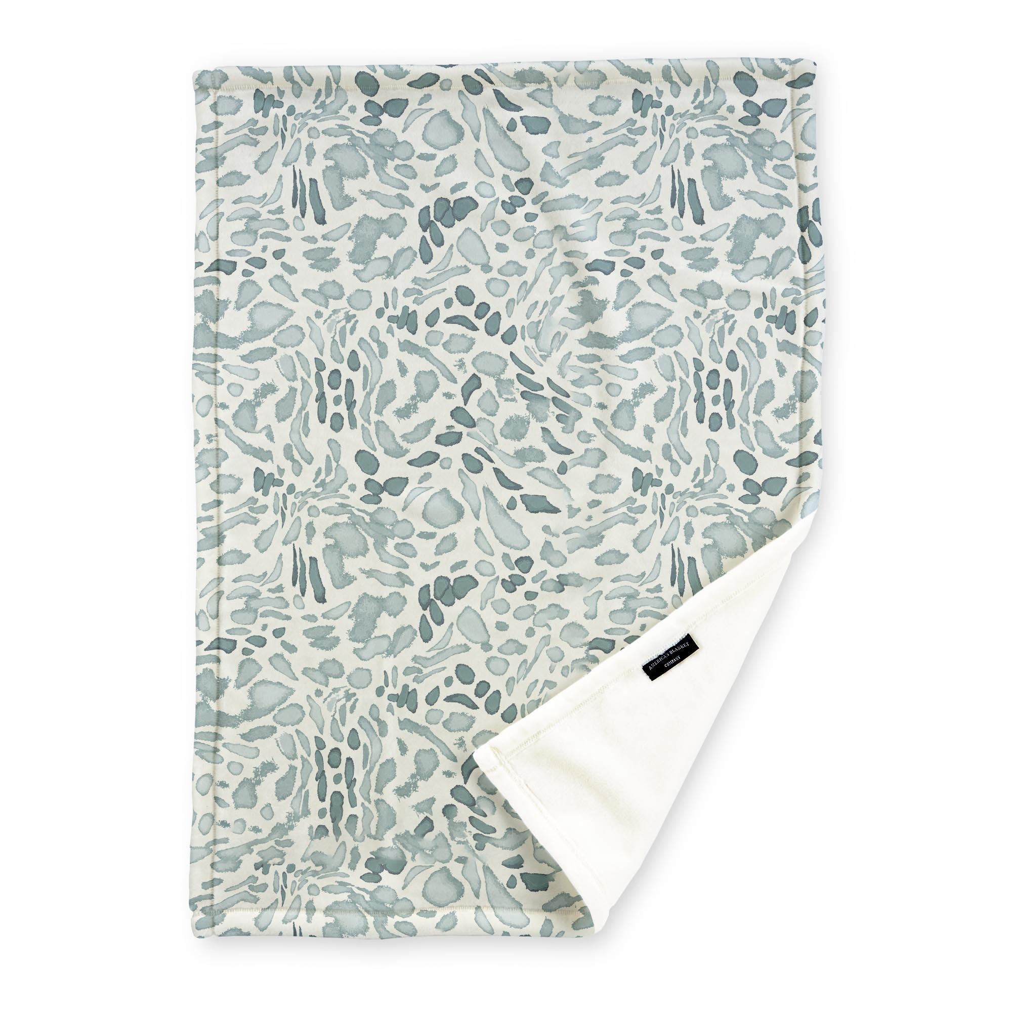 American Blanket Company - Luster Loft Fleece Blankets - Printed Fashion Fleece Throw Blankets - a Fleece blanket with a green Leopard pattern on a white background.