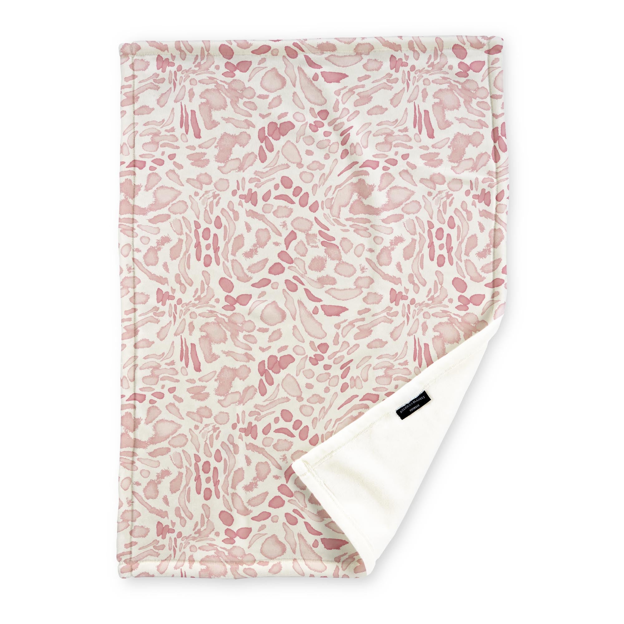 American Blanket Company - Luster Loft Fleece Blankets - Printed Fashion Fleece Throw Blankets - a Fleece blanket with a pink Leopard pattern on a white background.